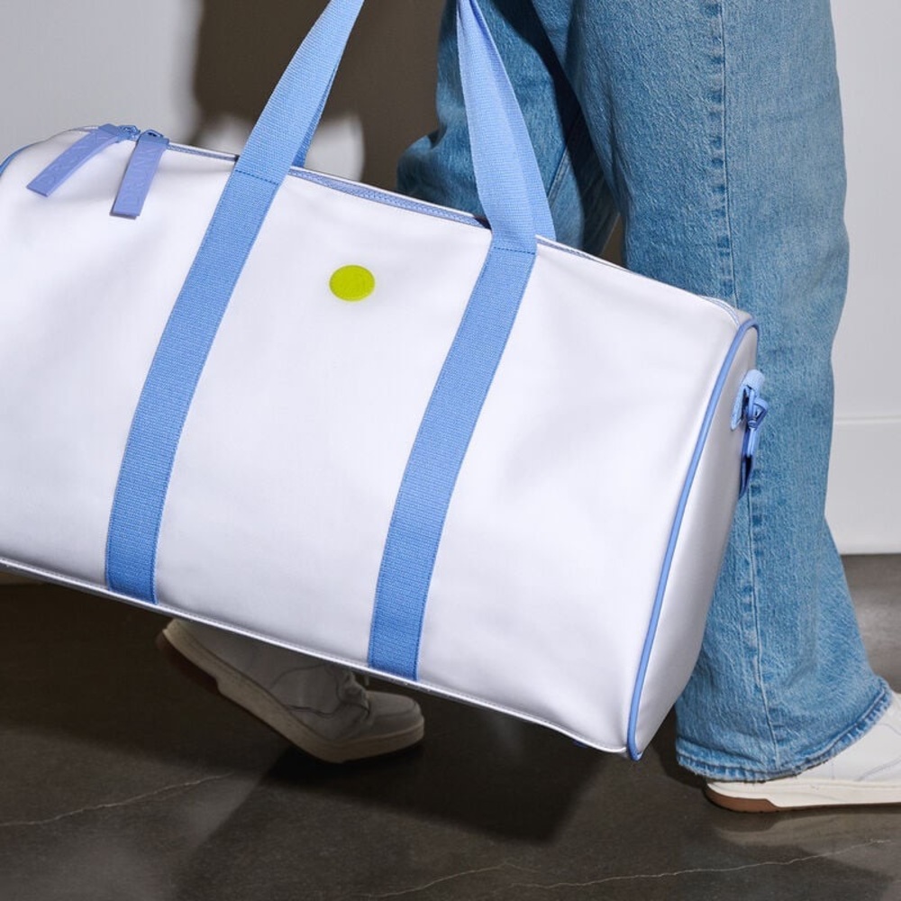 Drunk Elephant White and Blue Travel Bag